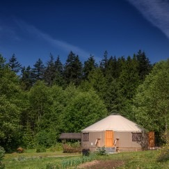 30' yurt in field with rich skies