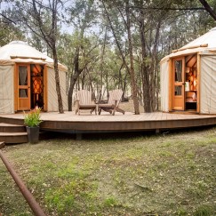 Two yurts for glamping with shared deck at Rancho Poquito in Texas