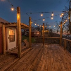 yurt with large deck and string lights