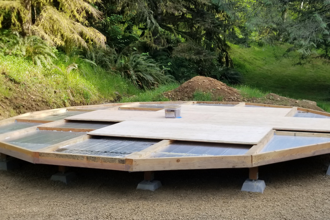 Yurt flooring and insulation installed.