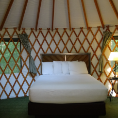 bedroom inside of modern pacific yurt.