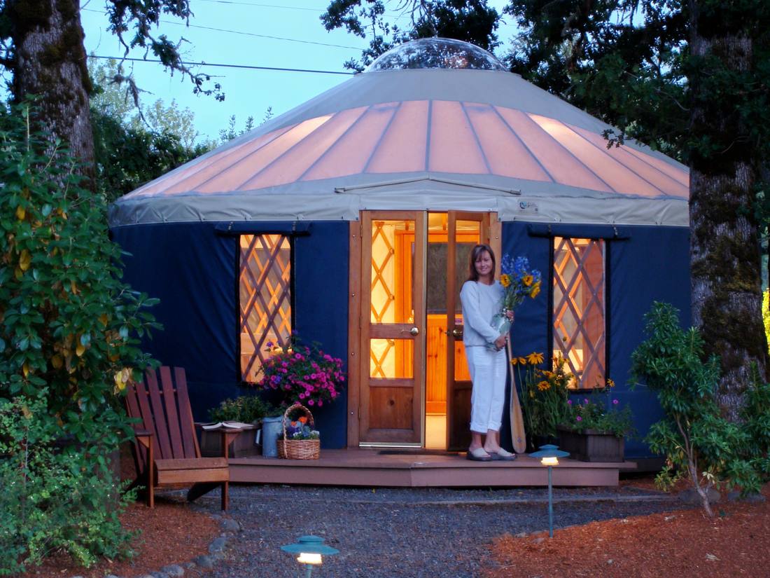 Interior of a Pacific Yurt set up as a calm retreat and wellness space
